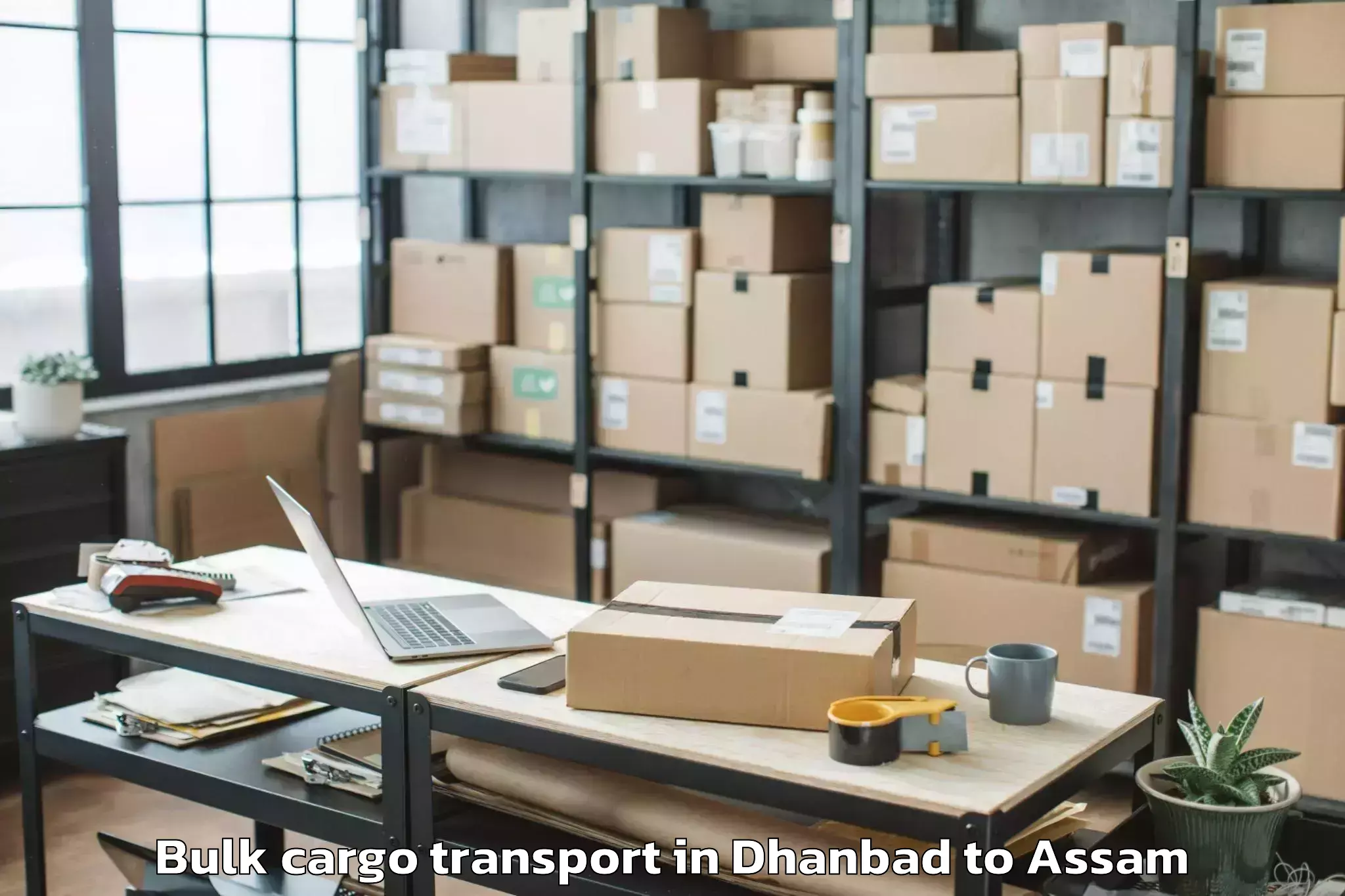 Book Dhanbad to Cotton University Guwahati Bulk Cargo Transport